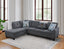 Front view of dark gray L-shaped sectional sofa with rounded arms and nailhead trim