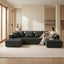 Front view of gray U-shaped corduroy sectional sofa with double chaise in a living room setting