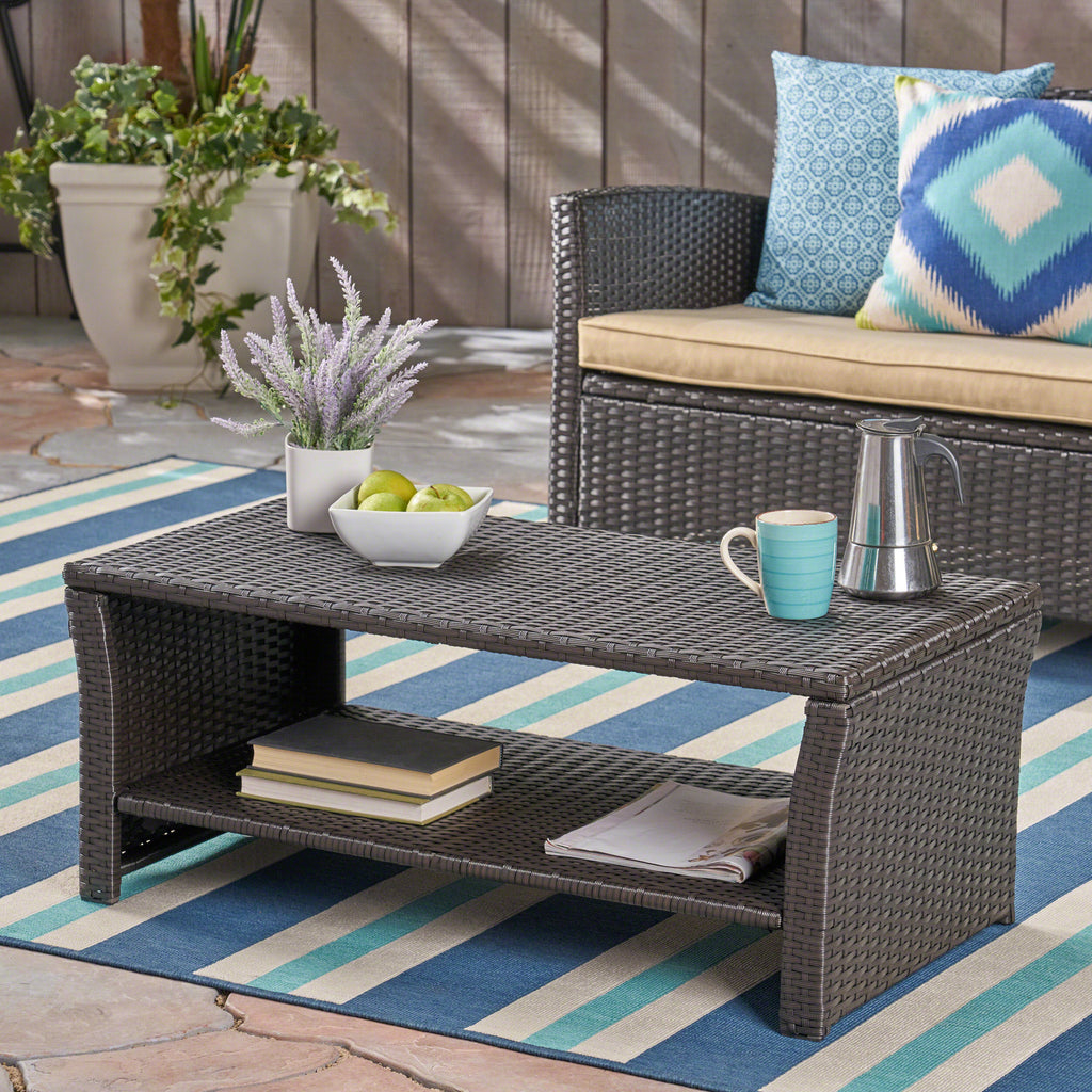 Front view of brown ST Lucia outdoor coffee table on a patio