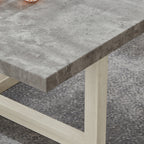 Three-quarter angle view highlighting the architectural intersecting base and faux concrete texture