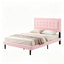 Front view of queen-size pink velvet upholstered bed frame with tufted headboard