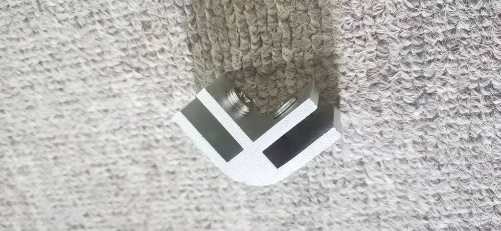 Side profile showing thickness and white frame of glass wind guard