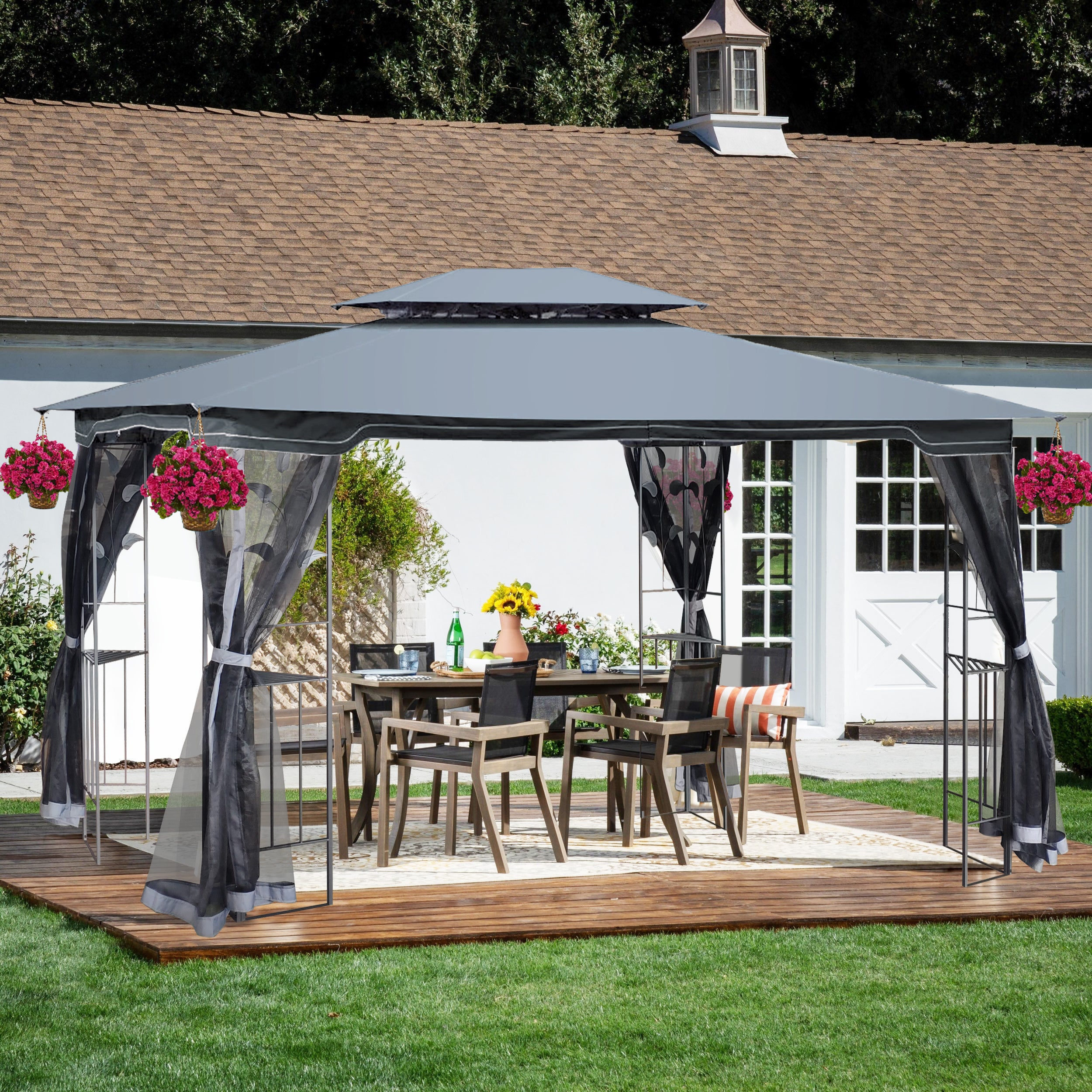 Front view of 13 ft x 10 ft outdoor gazebo with gray double-tier roof and black steel frame