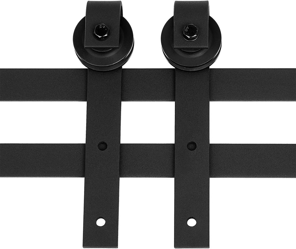 Close-up of black rail section and J-shape hangers mounted on a wooden door mockup
