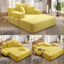 Front view of yellow oversized corduroy chaise lounge sofa bed with wide armrests and visible side storage pocket
