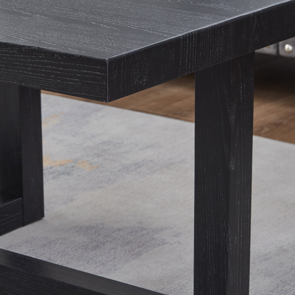 Side profile of black end table showing low 5.36-inch height and base detail