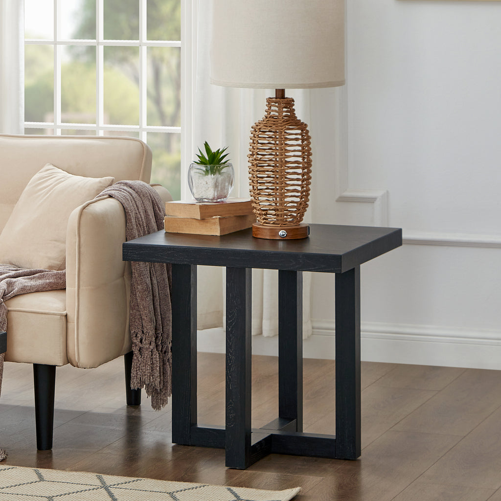 Luno Contemporary End Table in black shown in front view, highlighting rectangular top and intersecting base