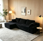 Front view of black corduroy frameless sectional sofa with L-shaped chaise