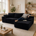 Vacuum-compressed black sofa inside a compact shipping box