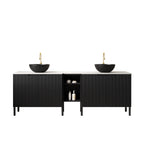 Top-down view highlighting Carrara white countertop and black ceramic vessel sinks