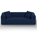 Front view of a blue 3-seat corduroy sofa in a modern living room setting