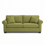 Side view showing rolled arms and tapered wooden legs