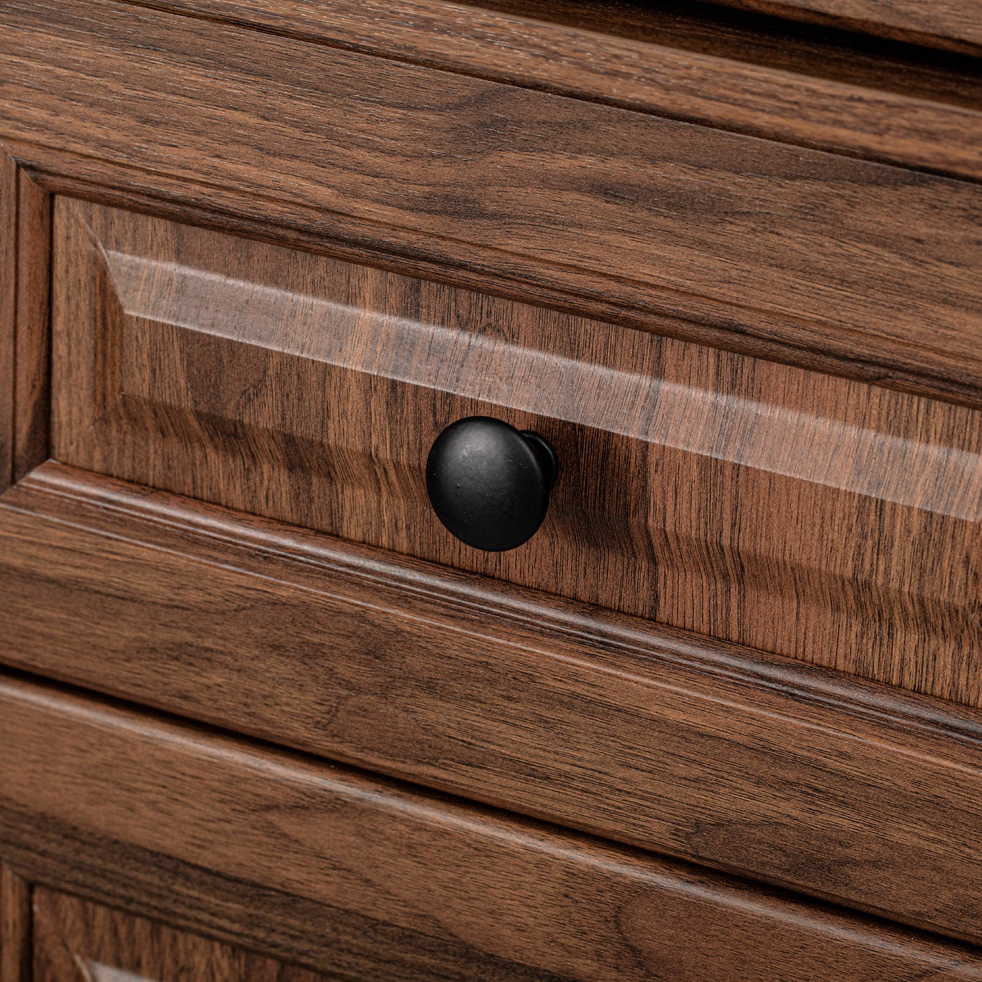 Close-up of one of the three pull-out cabinet organizers extended