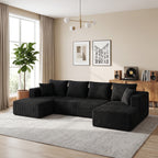 Close-up of wide-wale corduroy fabric texture on black sectional sofa