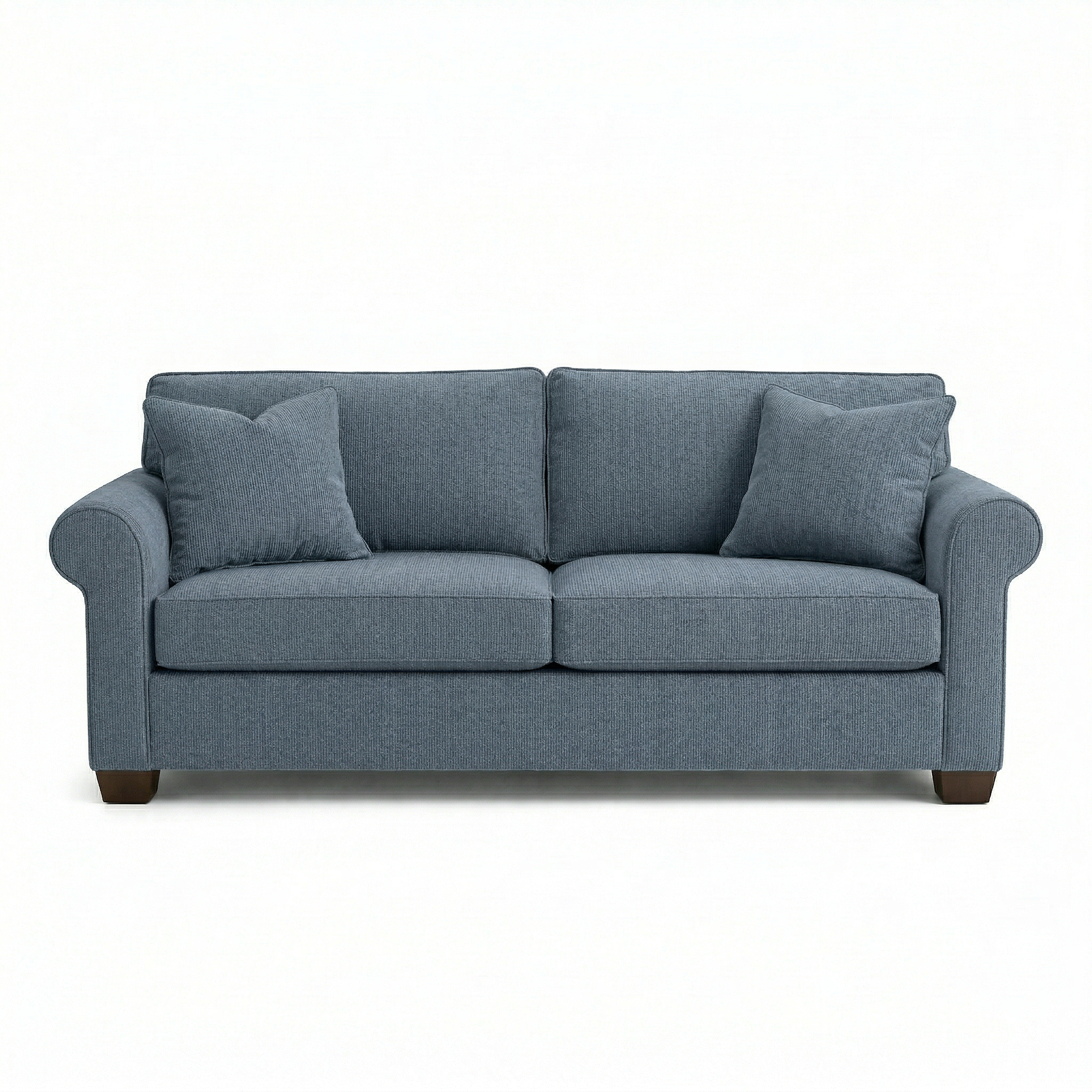 Irlanda sofa styled in a modern living room with neutral decor and natural light
