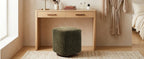 Olive vanity stool placed beside a bedroom vanity table
