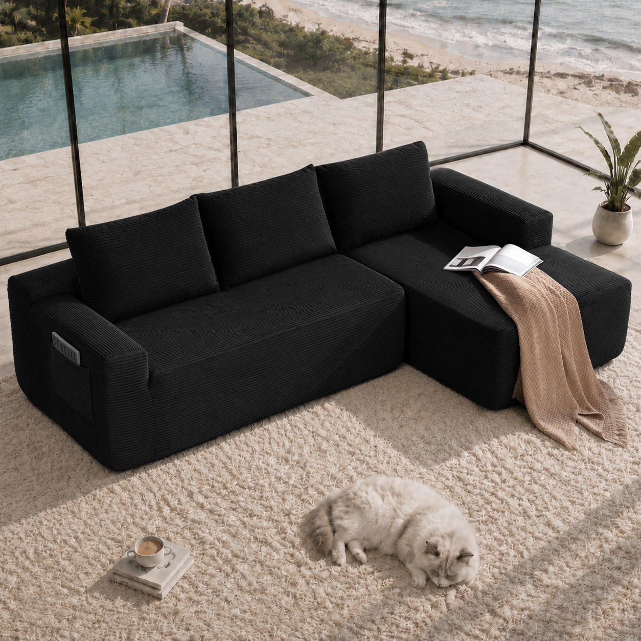 Front view of black corduroy 104-inch sectional sofa with L-shaped chaise and side pockets