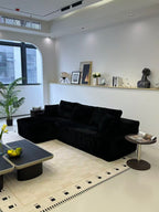 Angle view showing L-shaped chaise configuration and corduroy texture
