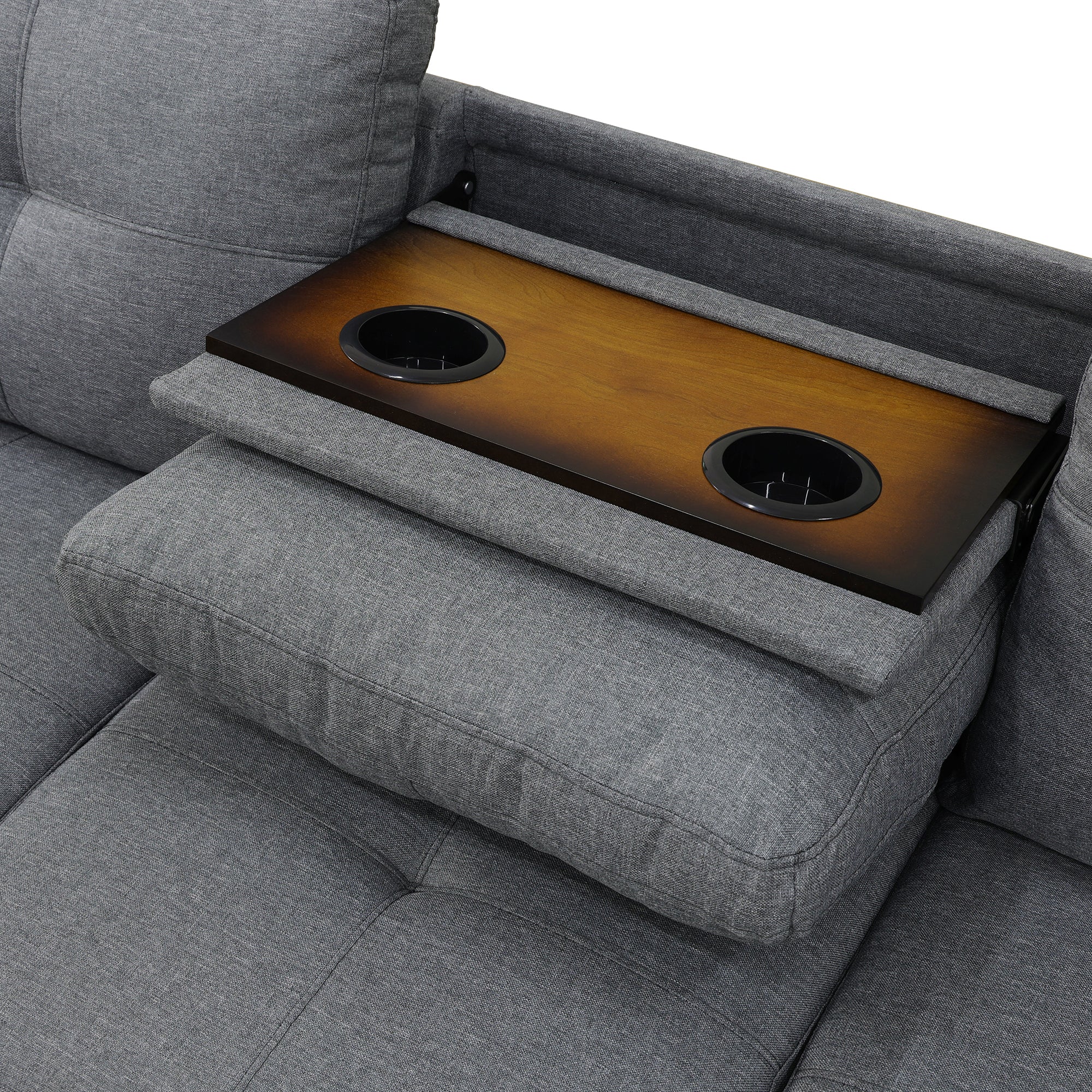Close-up of pull-down middle seat with two built-in cup holders